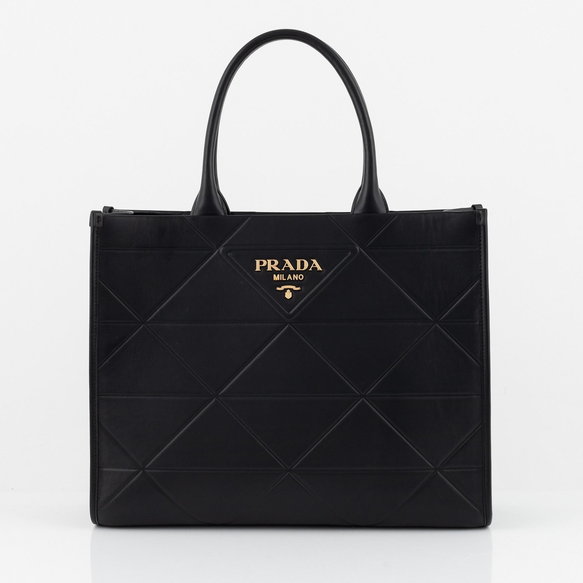 Prada, a black leather bag.