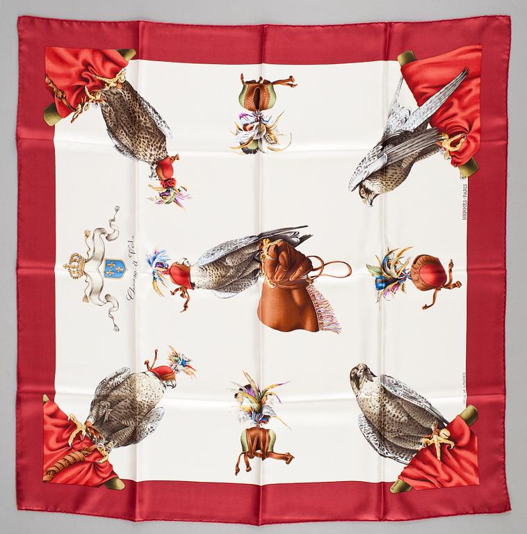 A silk scarf "Chasse a vol" by Hermès.