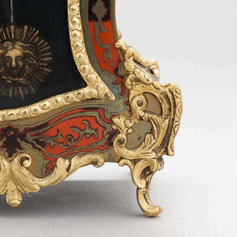 A French boulle style mantel clock, late 19th Century.