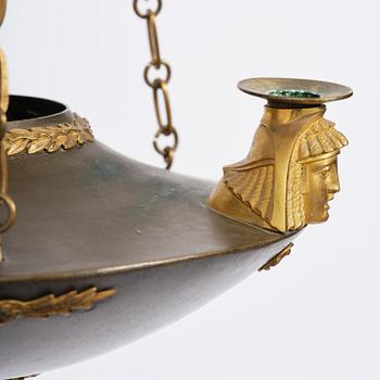 A Swedish Empire 19th century three-light hanging-lamp.