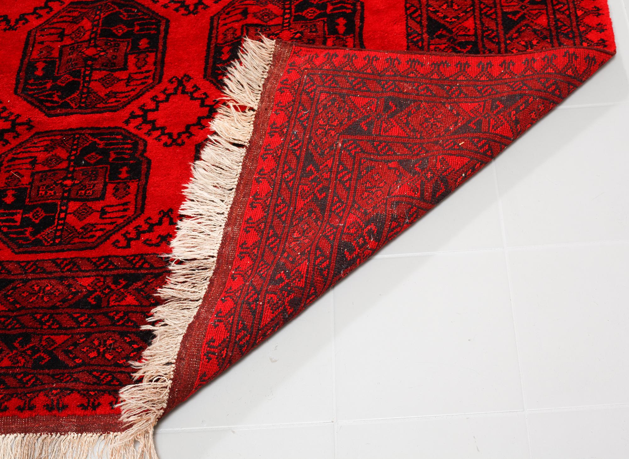 An Afghan rug, old, ca 280 x 210 cm.