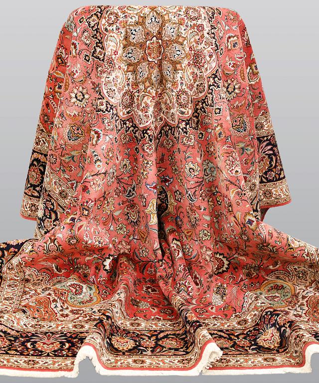 A part silk figural Tabriz carpet, so-called 50 Radj, c. 405 x 299 cm.