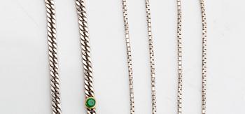 2 chains 18k whitegold, 1 with green stones, total weight 12,4 g.