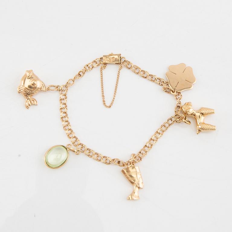 Bracelet Bismarck link 18K gold with charms.