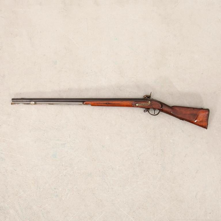 A percussion rifle, Swedish, m/1851 alteration model.