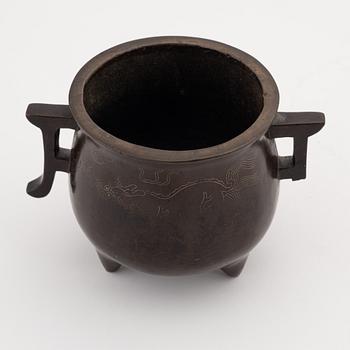 A Chinese tripod bronze censer, 20th century.
