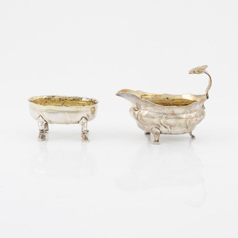 A Swedish Parcel-Gilt Silver Rococo Creamer and Salt Cellar, 18th century.