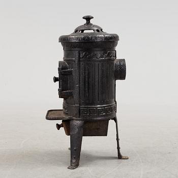 a cast iron stove by Husqvarna on the first half of the 20th century.