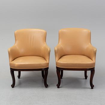 A pair of leather opholstered lounge chairs from 1927, Nordiska Kompaniet.