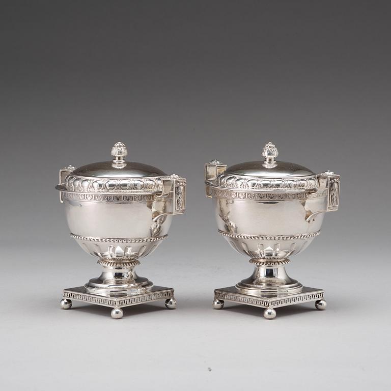 A pair of Swedish late 18th century silver sugar bowls and covers, mark of Pehr Zethelius, Stockholm 1780 and 1781.