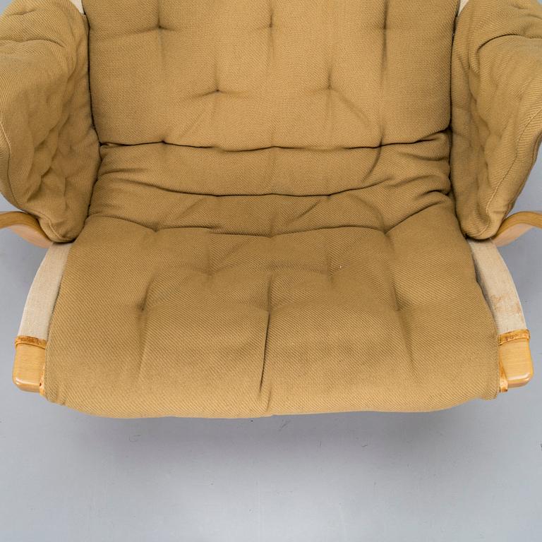 Bruno Mathsson, A "Pernilla" armchair with footstool, for DUX, designed in 1944.