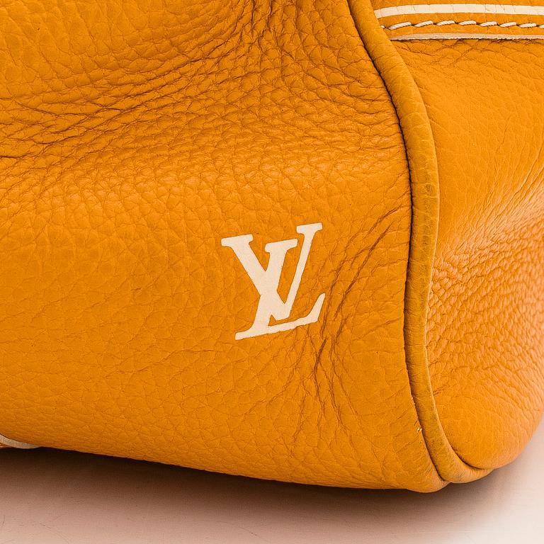 Louis Vuitton, a 'Tobago Carryall' bag.