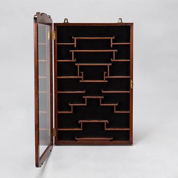 A Chinese 20th century hardwood wall cabinet.
