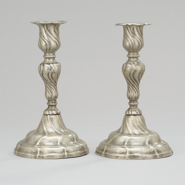 Two matched Rococo pewter candlesticks by Gudmund Östling (1762-1790).