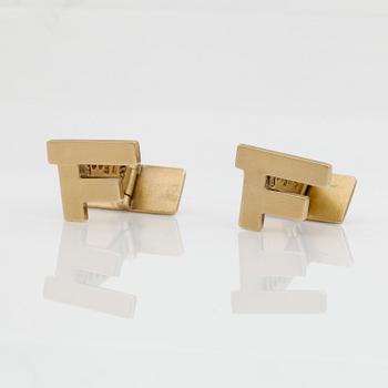 MANCHETTKNAPPAR, ett par. 18k guld, 1981. Ca 12g.