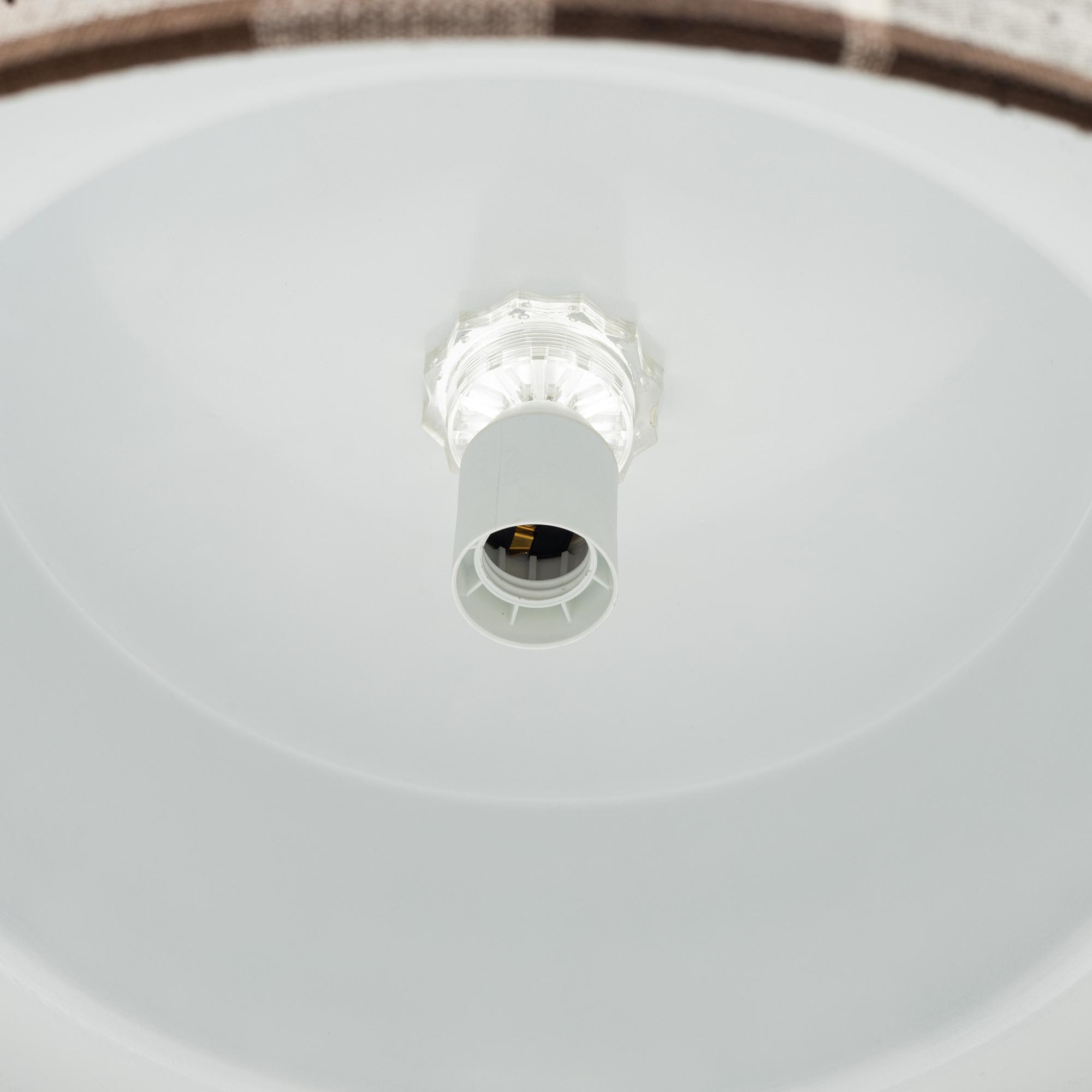 A brass and textile ceiling light. Luxus, Vittsjö.