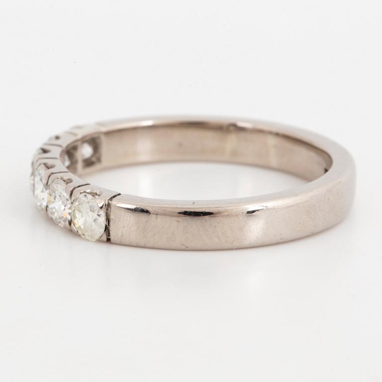 Half eternity brilliant-cut diamond ring.