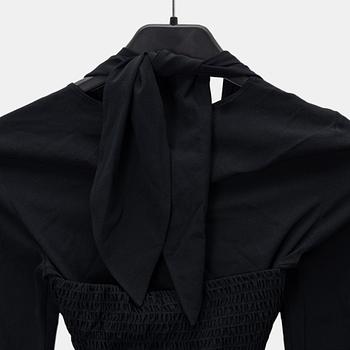 Chanel, A black silk top, size 34.