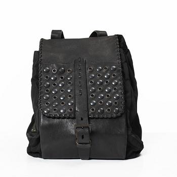 Prada, A nylon and leather backpack.