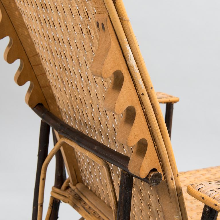 An early 20th century rattan lounge chair/sun chair.