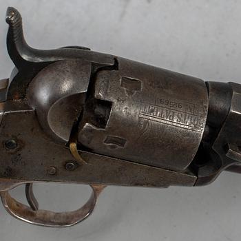 A Colt 1849 pocket percussion revolver with serial no 92569.