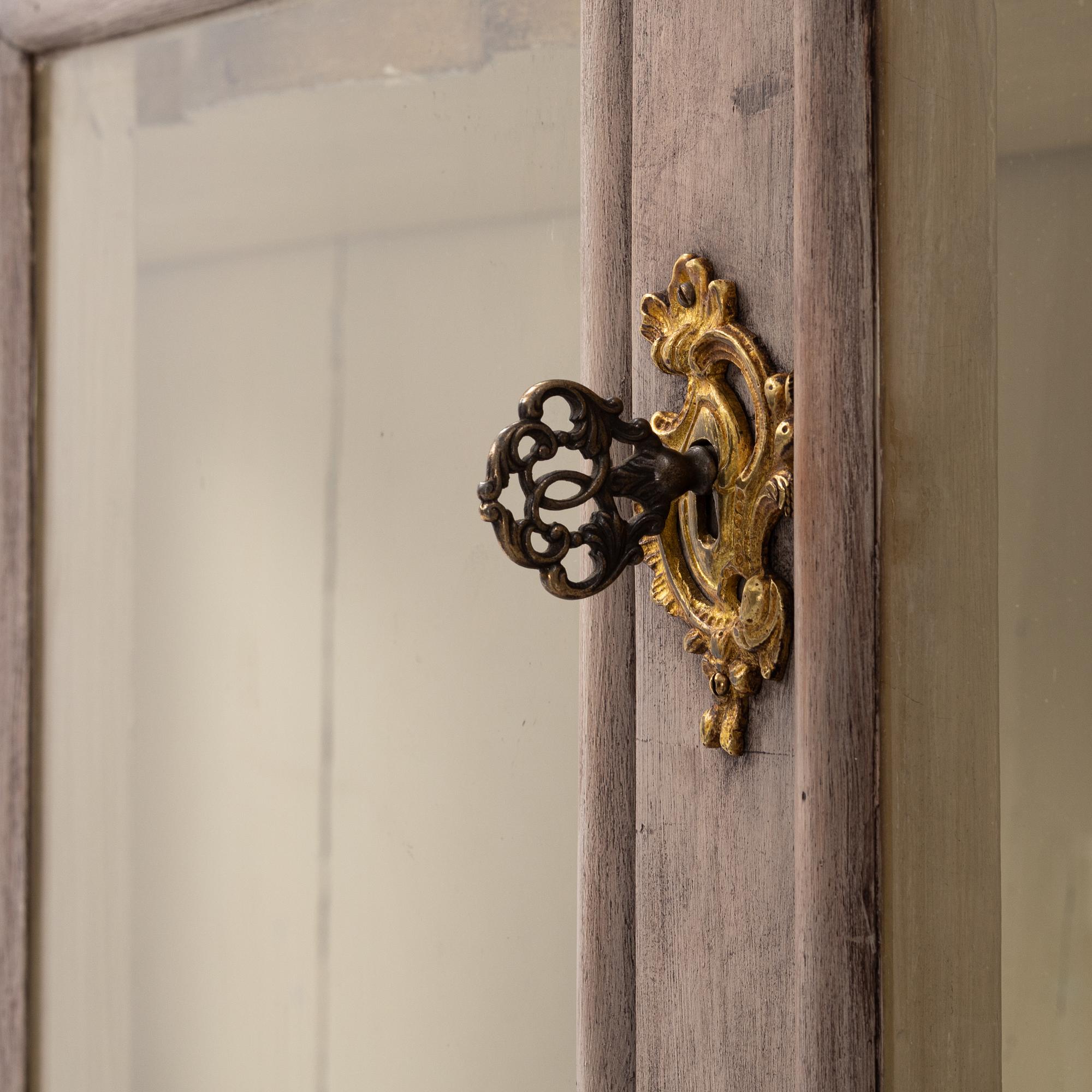 A painted Rococo style cabinet, early 20th Century.