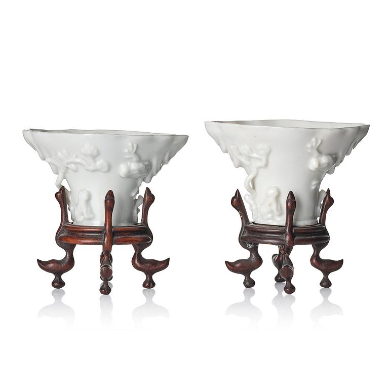 Two blanc de chine rhinoceros libation cups, Qing dynasty, Kangxi (1662-1722).