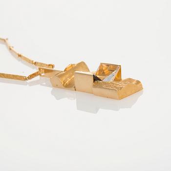 HALSSMYCKE, "Janus", 18K guld, bergskristall och rökkvarts. Björn Weckström Lapponia 32,0 g. Suunniteltu 1965.