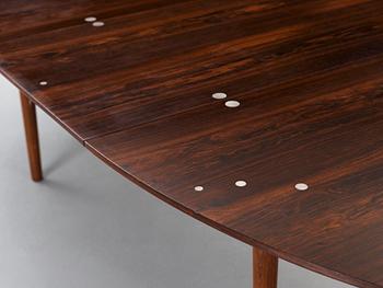 A Finn Juhl rosewood 'Judas' dining table, probably by Niels Vodder, Denmark 1960's.