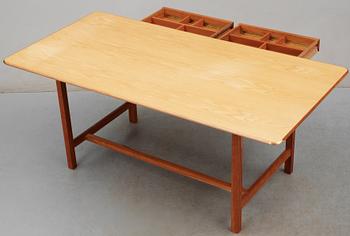 A Josef Frank ash and mahogany desk with brass fittings, by Svenskt Tenn.