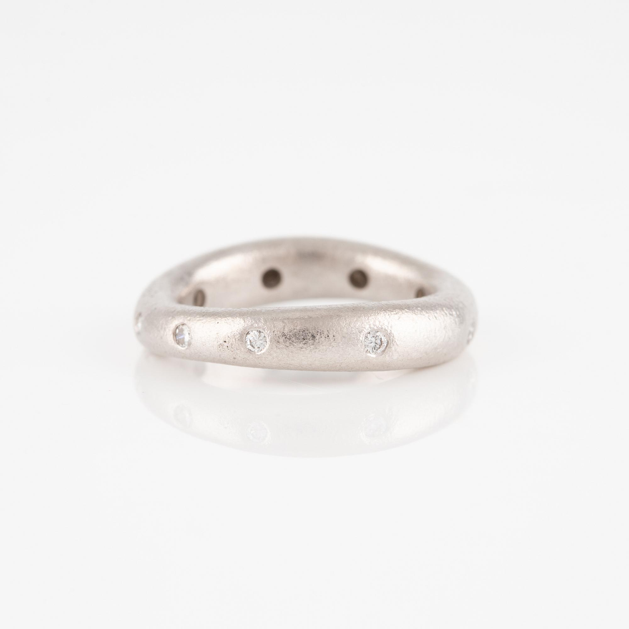 Ole Lynggaard two "Love" rings no. 4 in 18K white gold with round brilliant-cut diamonds.