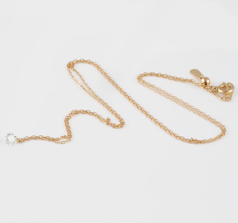 HÄNGE, 18K guld med briljantslipad diamant 0.20 ct. Vikt 1,0 gram.