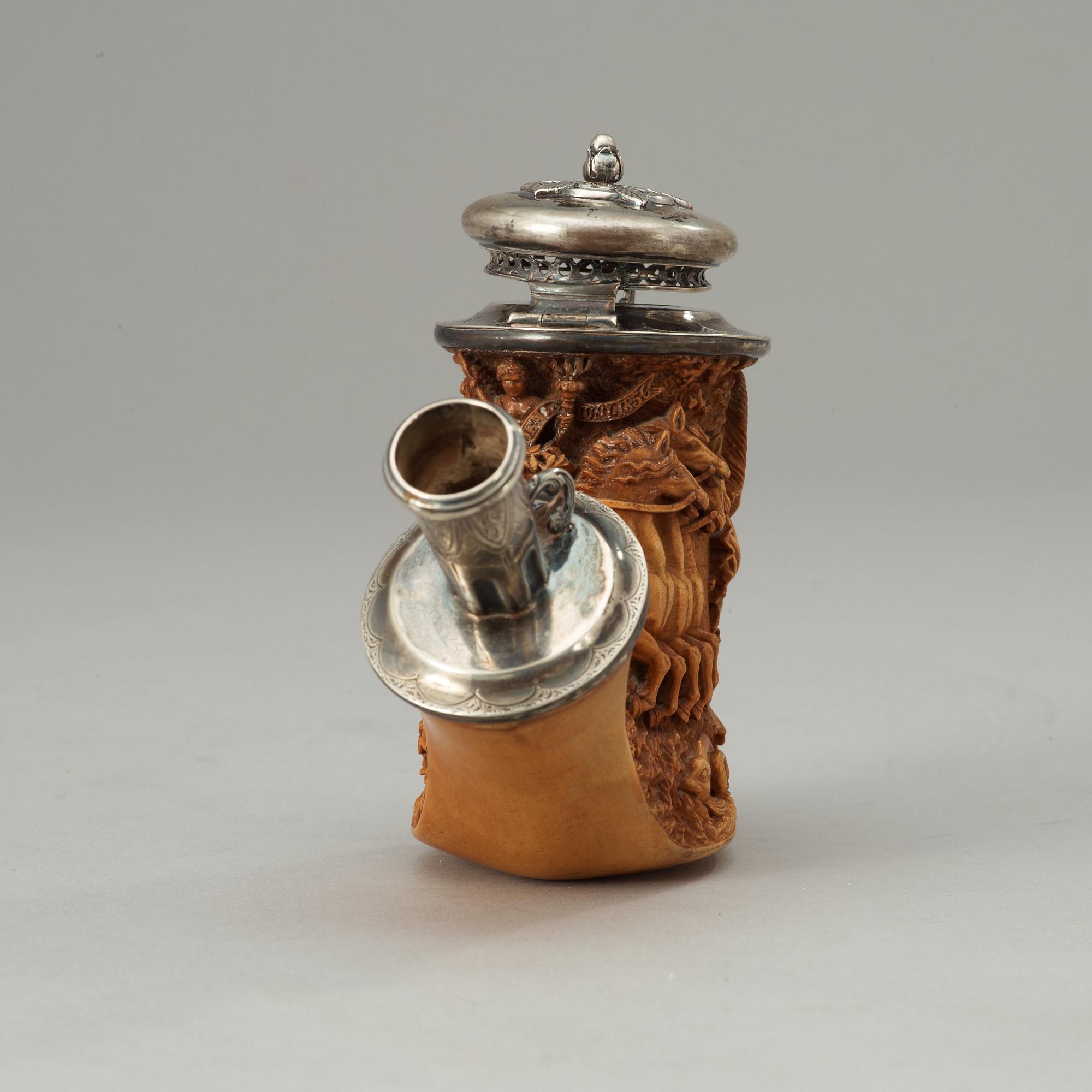 A Swedish birch carved pipe bowl by S.Isberg (not signed) dated 1856.