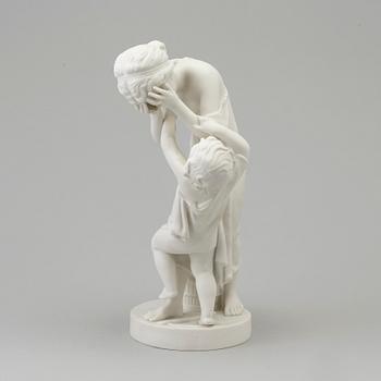 A biscuit figure of a woman and a boy, Gustafsberg, early 20th Century.