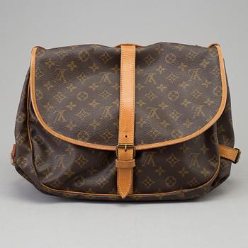 LOUIS VUITTON, a 'Saumur 35' monogram canvas bag.