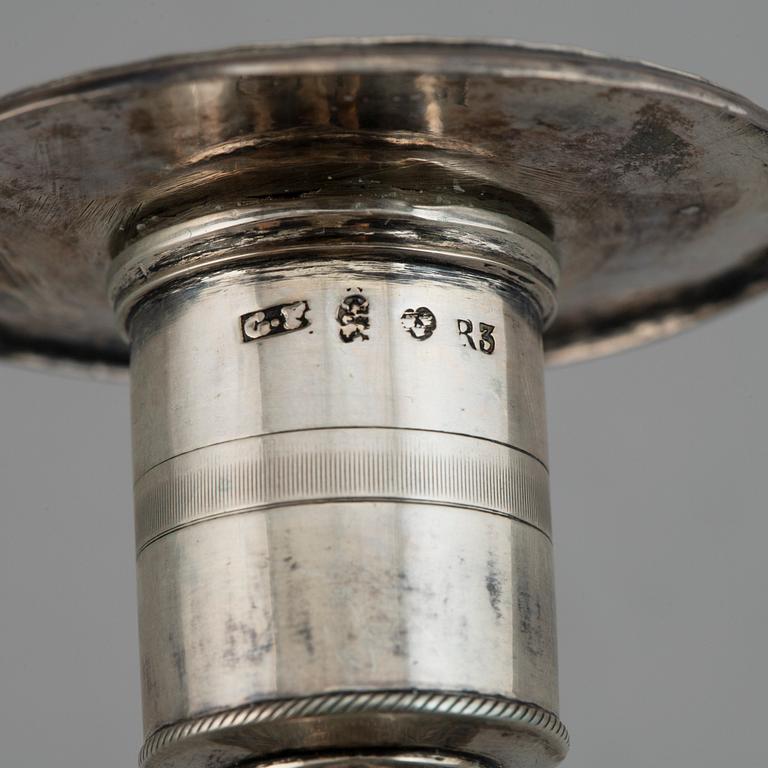 A pair of Empire silver candle sticks, 1823.