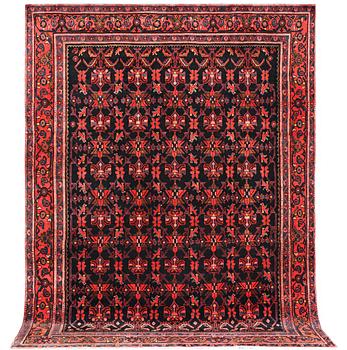 A Borujerd carpet, c. 300 x 225 cm.