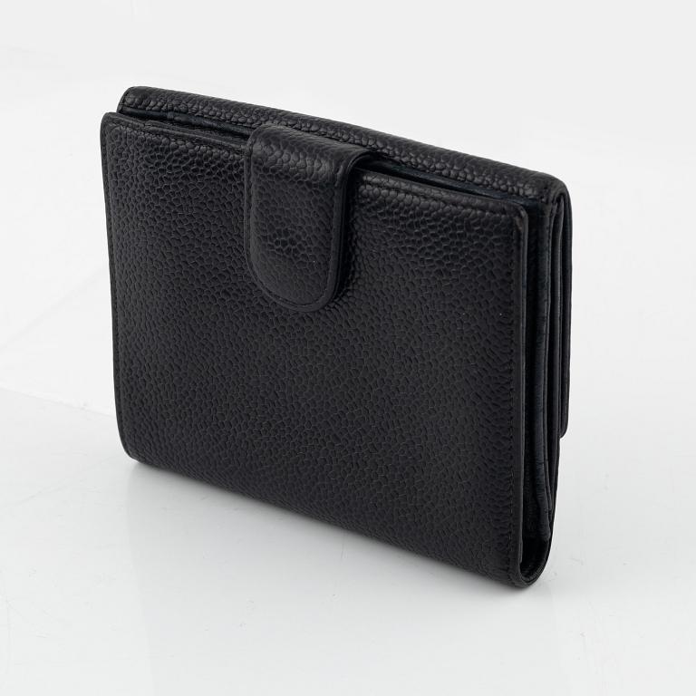 Chanel, a black caviar leather wallet.