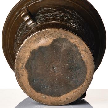 A Swedish late baroque bronze mortar and pestle, dated 1759.