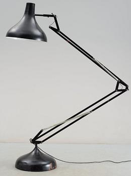A black lacquered metal industrial floor lamp, Germany 1950's-60's.