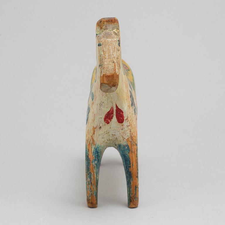 A Dala horse, painted pine, circa 1900.