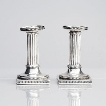 A Swedish pair of 18th century Gustavian silver candlesticks, marks of Johan Ekholm, Stockholm 1795.