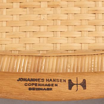 Hans J. Wegner, a pair of oak and rattan 'Folding chairs', model 512, Johannes Hansen, Denmark 1950's.