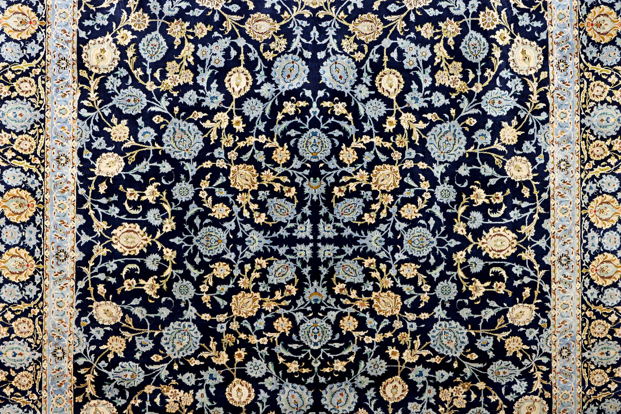 A Kashan carpet, c. 395 x 305 cm.