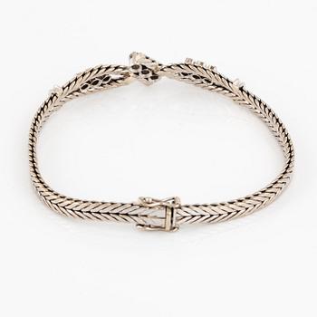 ARMBAND, med briljantslipade diamanter totalt 0.55 ct, importstämplat.