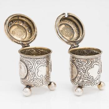 A pair of silver salt and mustard tankard,  C.G. Hallberg, Stockholm 1911 and 1914.