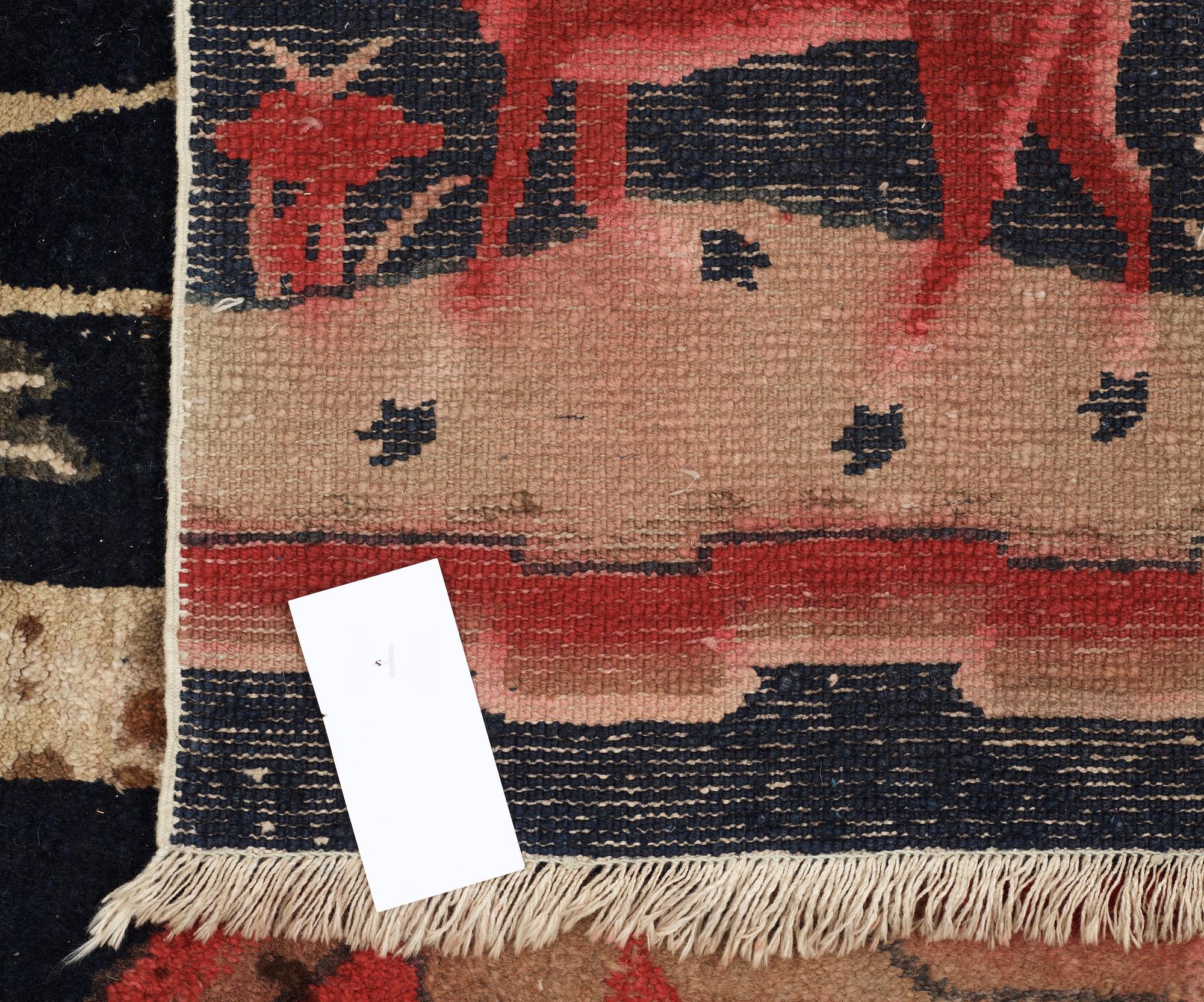 A semi-antique Baotou figural so called Wedding Rug.