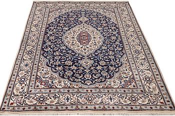 A carpet, Nain, part silk, 9 laa, ca. 285 x 200 cm.