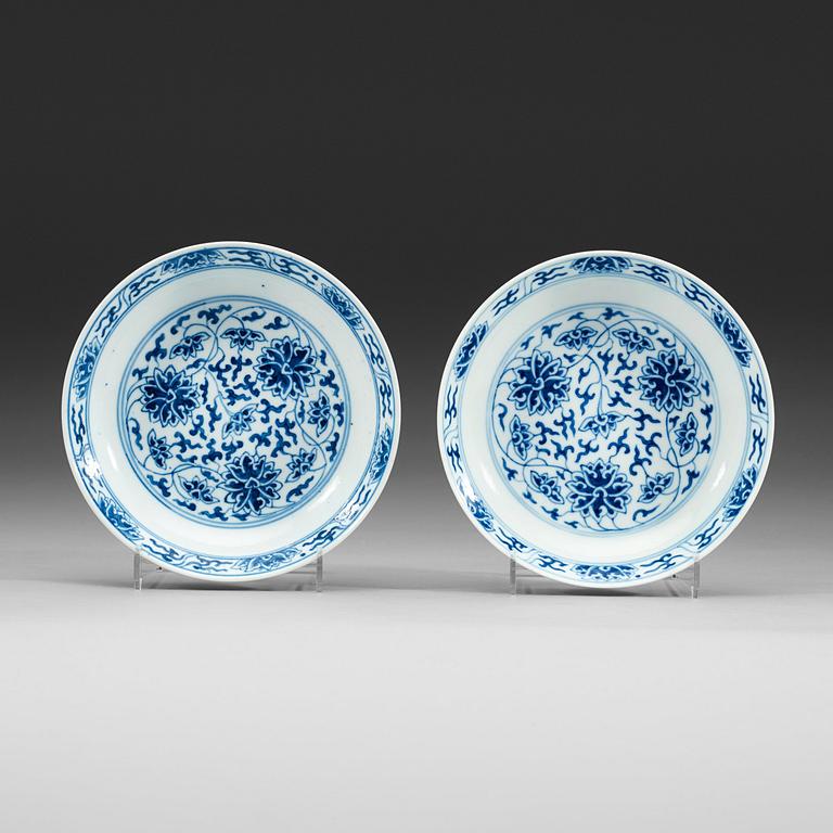 A pair of blue and white lotus dishes, Qing dynasty, Guangxu mark and period (1874-1908).