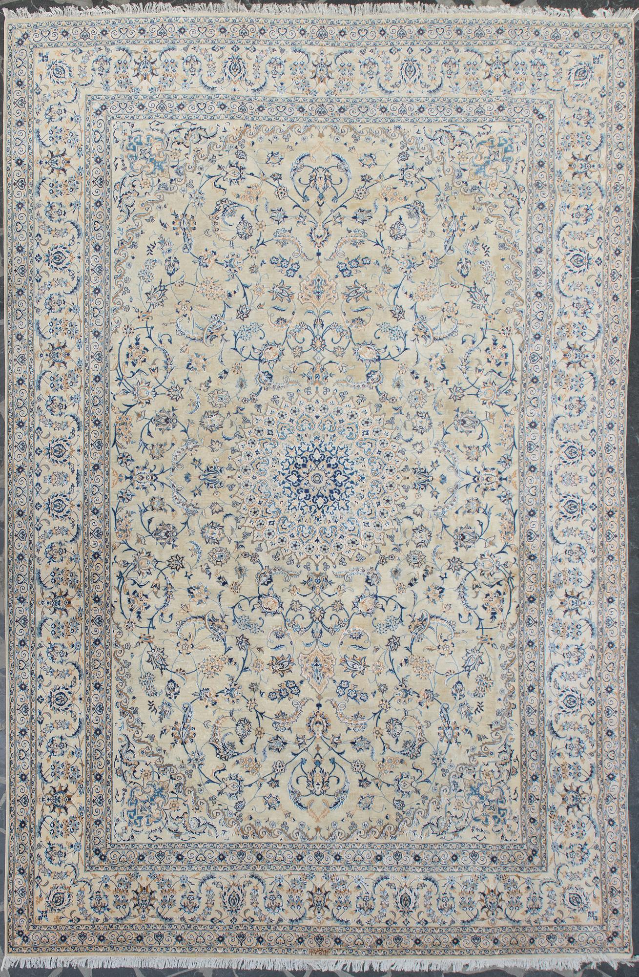 A carpet, Nain, part silk, 9 LAA, ca  577 x 380 cm.